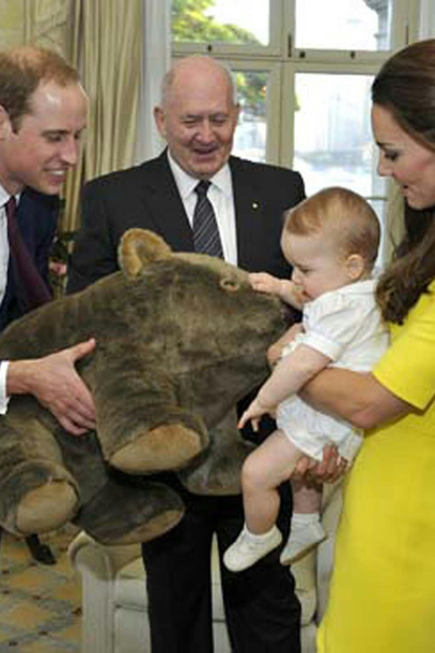 63-62. Cutest picture ever_ Prince George plays with his new toy in Sydney