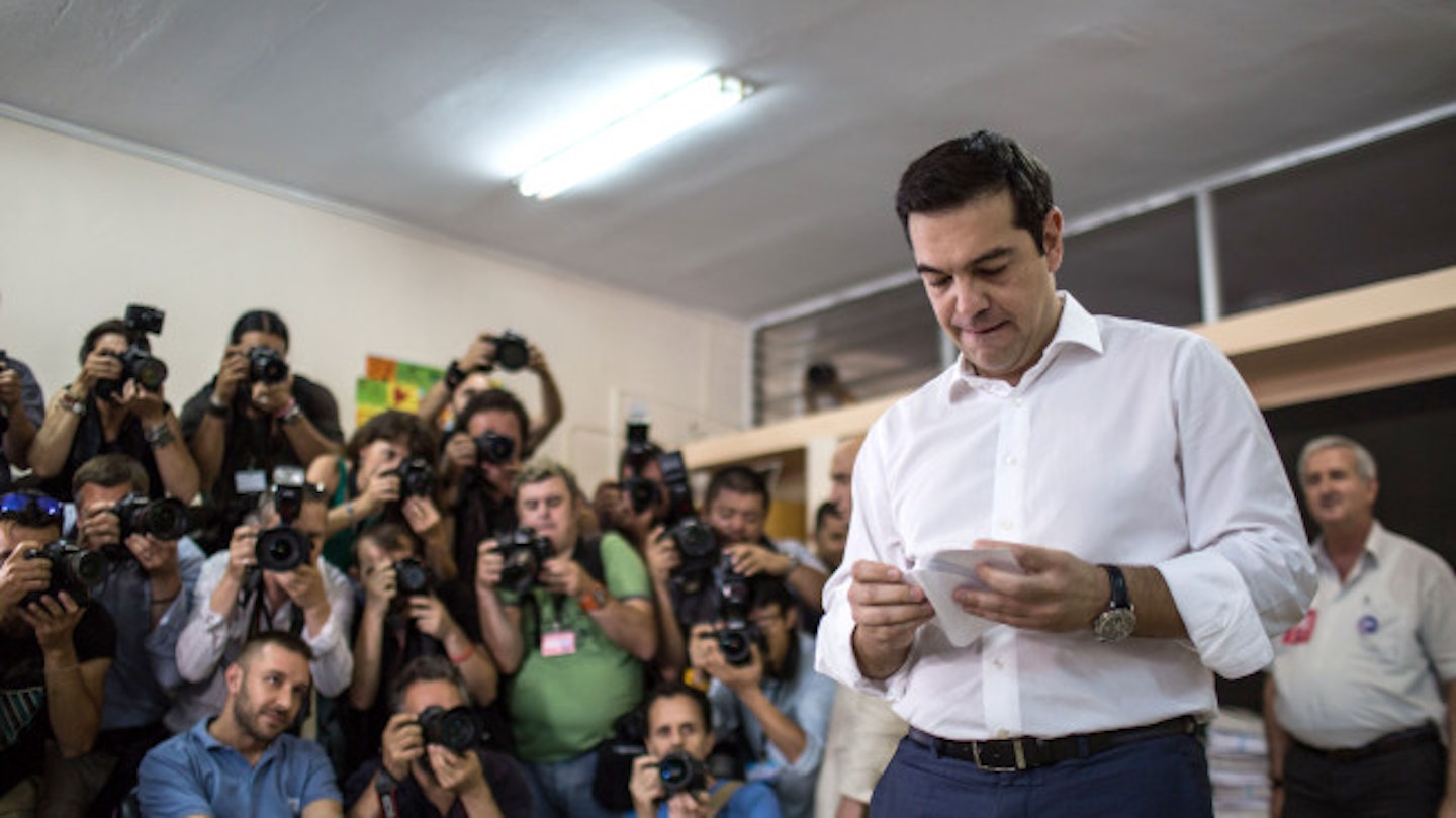 Prime Minister Alexis Tsipras casts his vote in Sunday's referendum