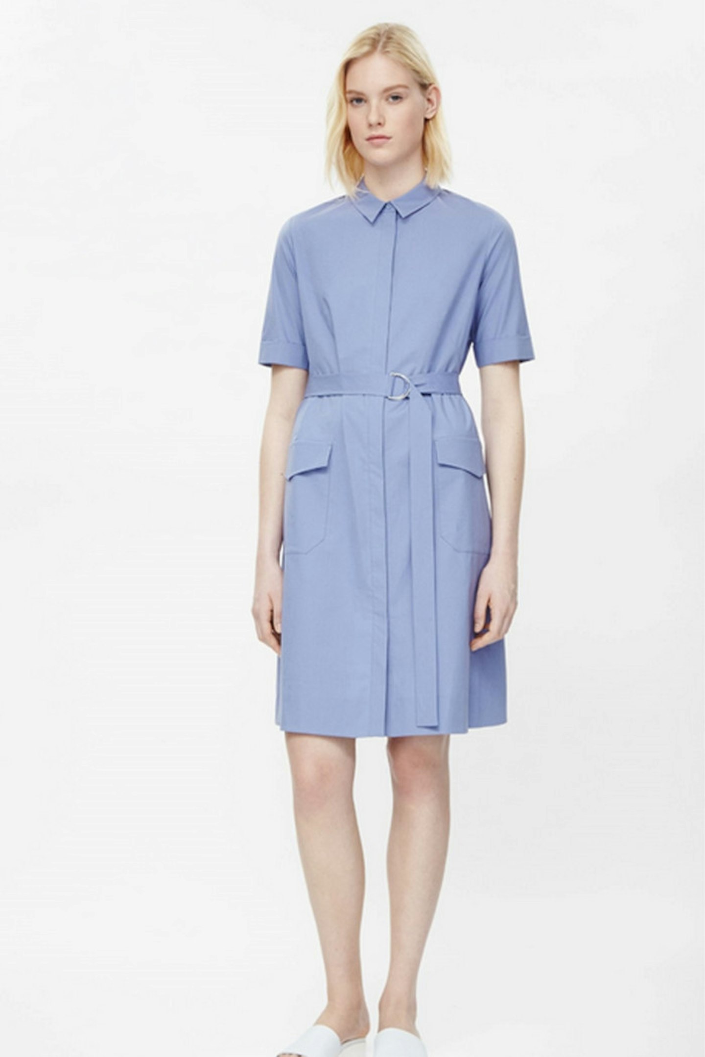 Be a fashion maverick and layer this belted dress over some beige cotton culottes - its fashion blogger's most recent styling trick.