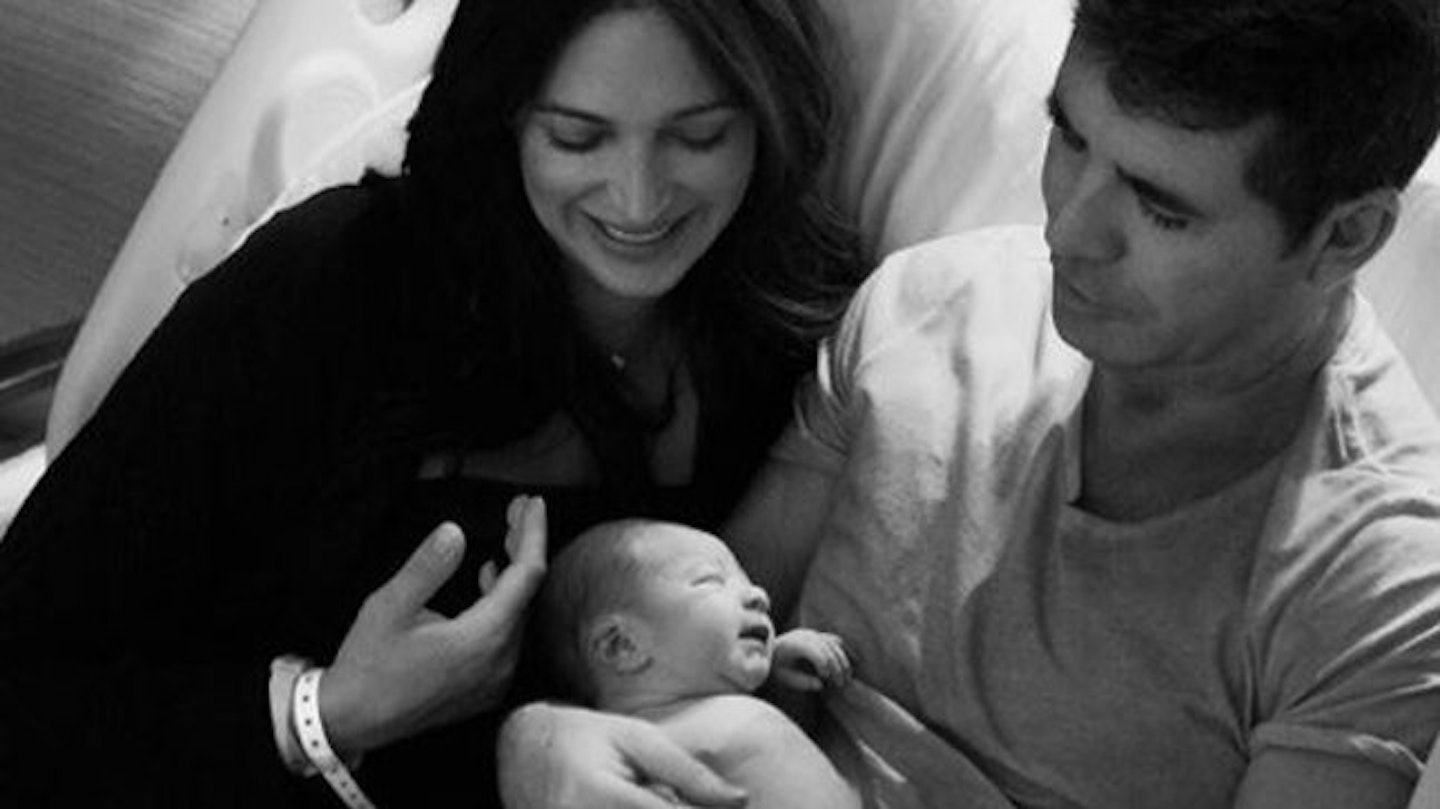 Simon and partner Lauren Silverman with son Eric.