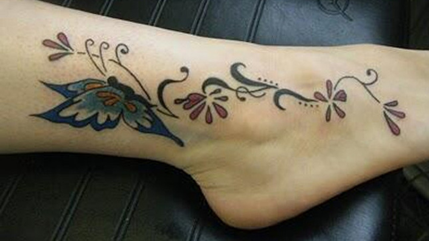 Butterfly Tattoos on Women's Feet: Bold & Beautiful