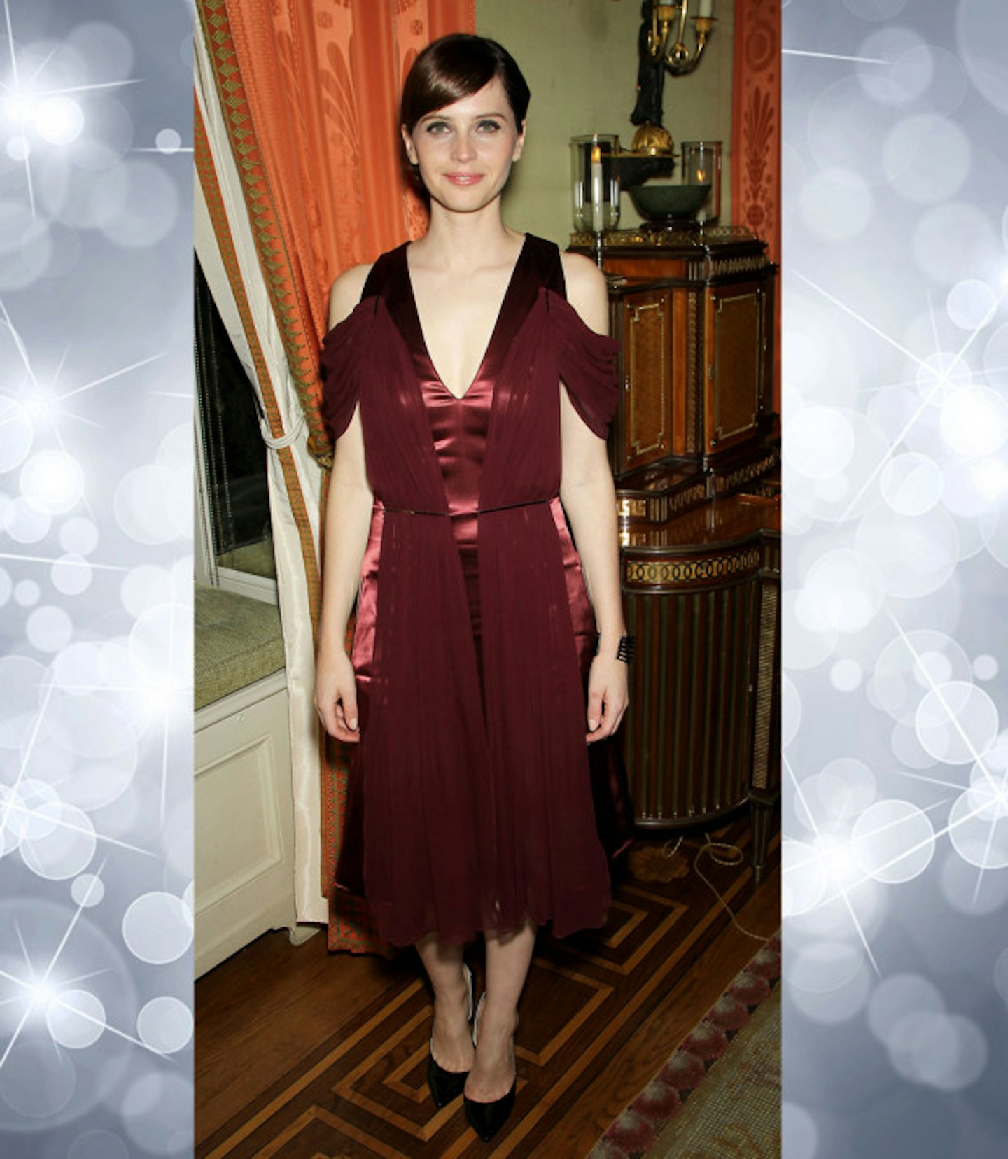felicity-jones-best-outfits-burgundy-satin-tulle-dress