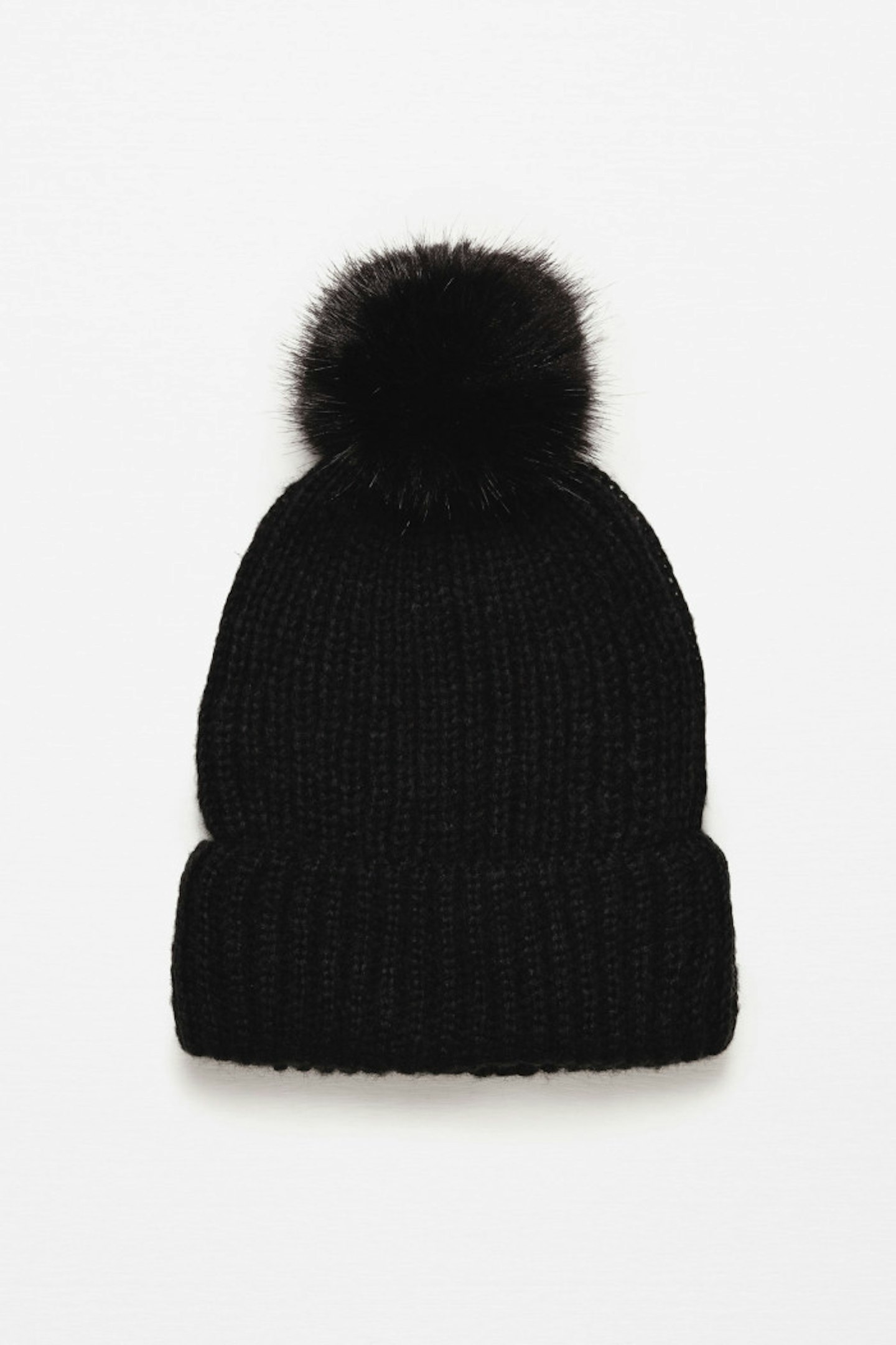 There's nothing quite like a bobble hat to compliment a winter look. We love this one from Zara.