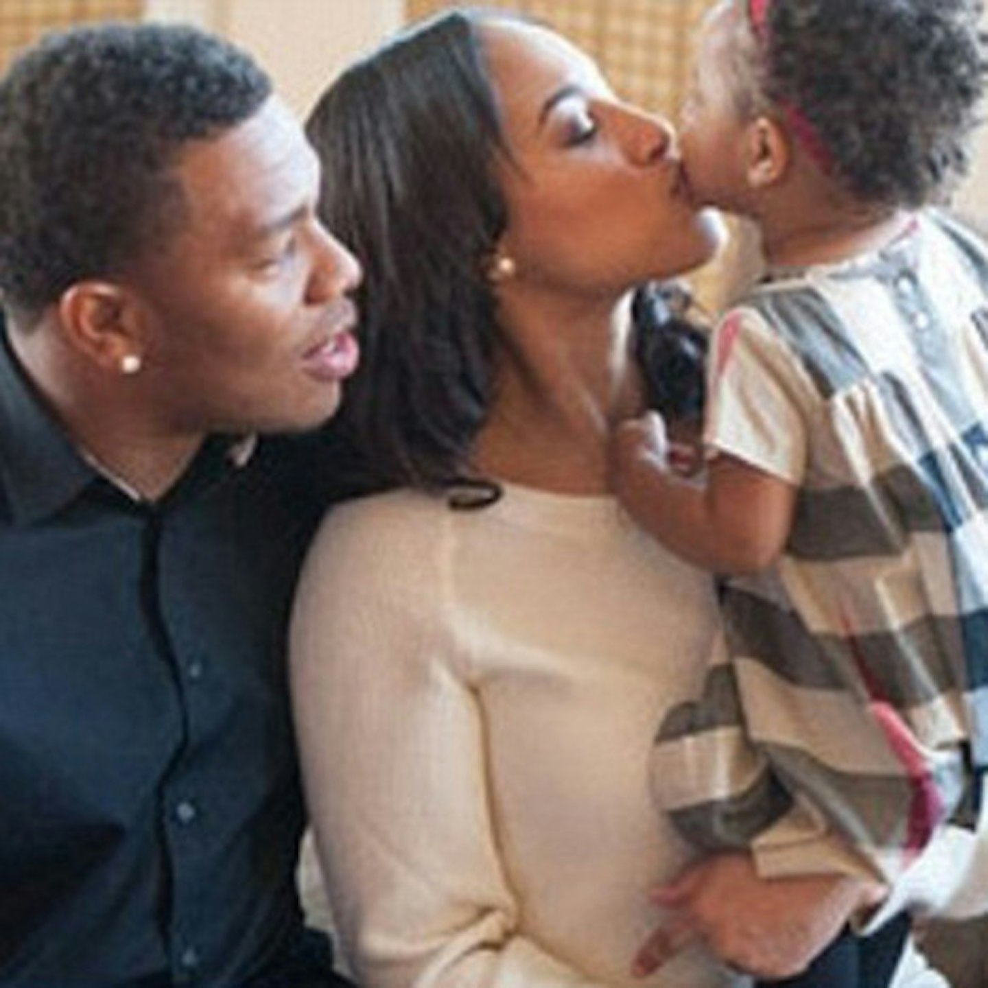 Ray Rice and Janay Palmer with their daughter (via Instagram)