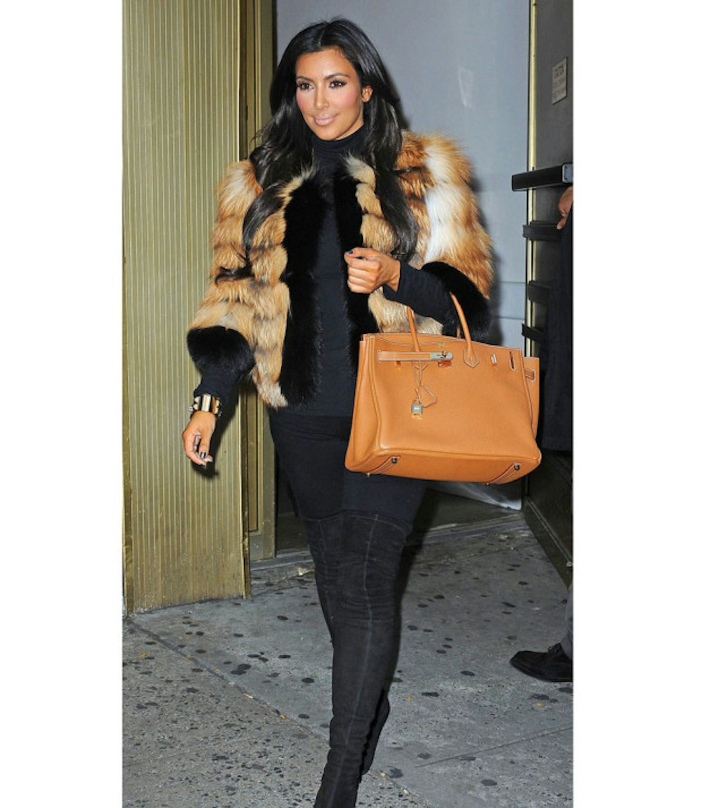 kim-kardashian-fashion-disaster-fur-coat-tan-bag-thigh-boots