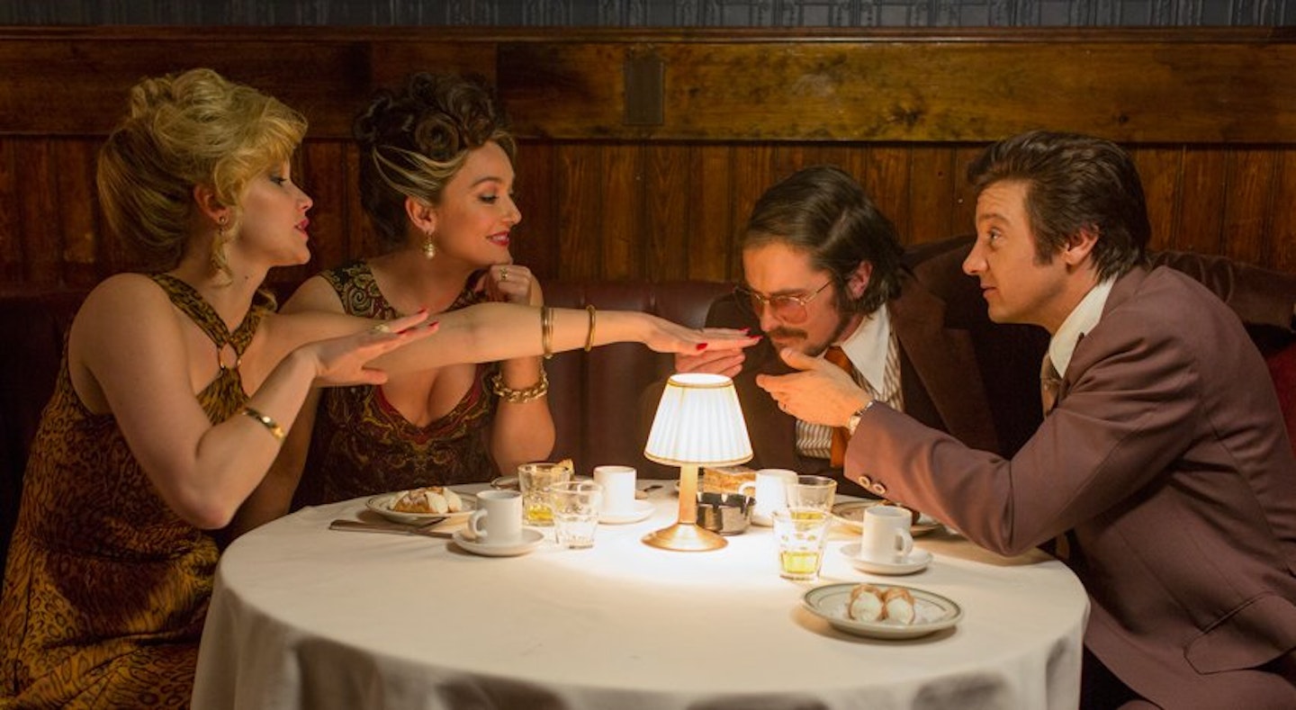 Dinner-scene-American-Hustle-Photo-by-Francois-Duhamel-Copyright-2013-Annapurna-Productions-LLC