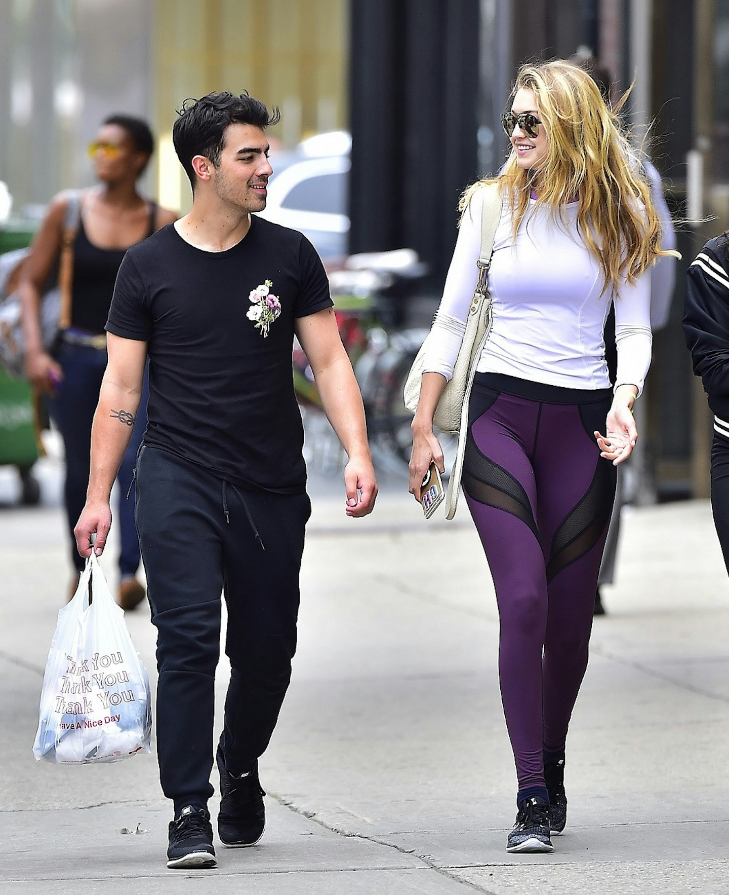 Gigi and Joe leave the gym together in NYC