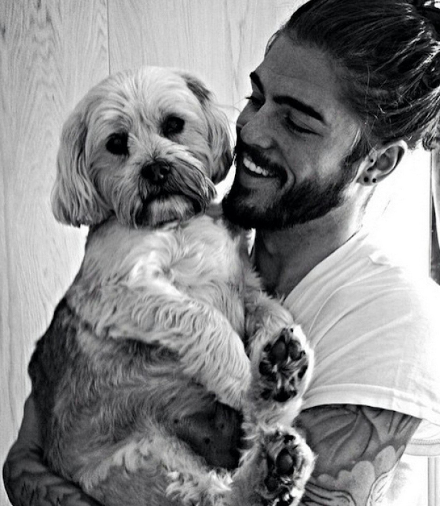 Who could be mean to Sam? Look how cute he is with this puppy...