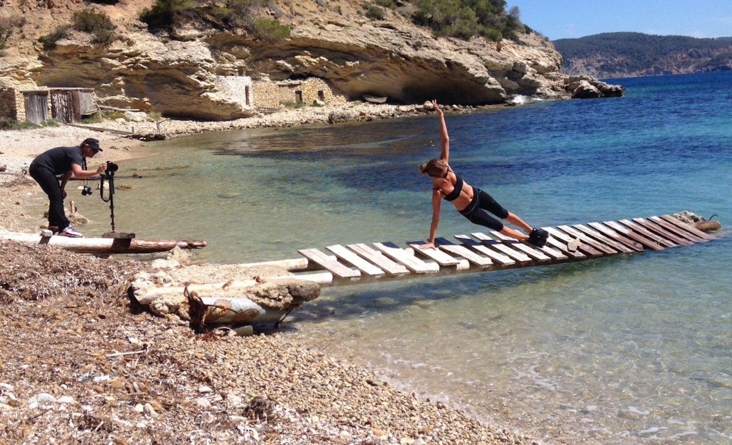 Millie Mackintosh planking on a beach