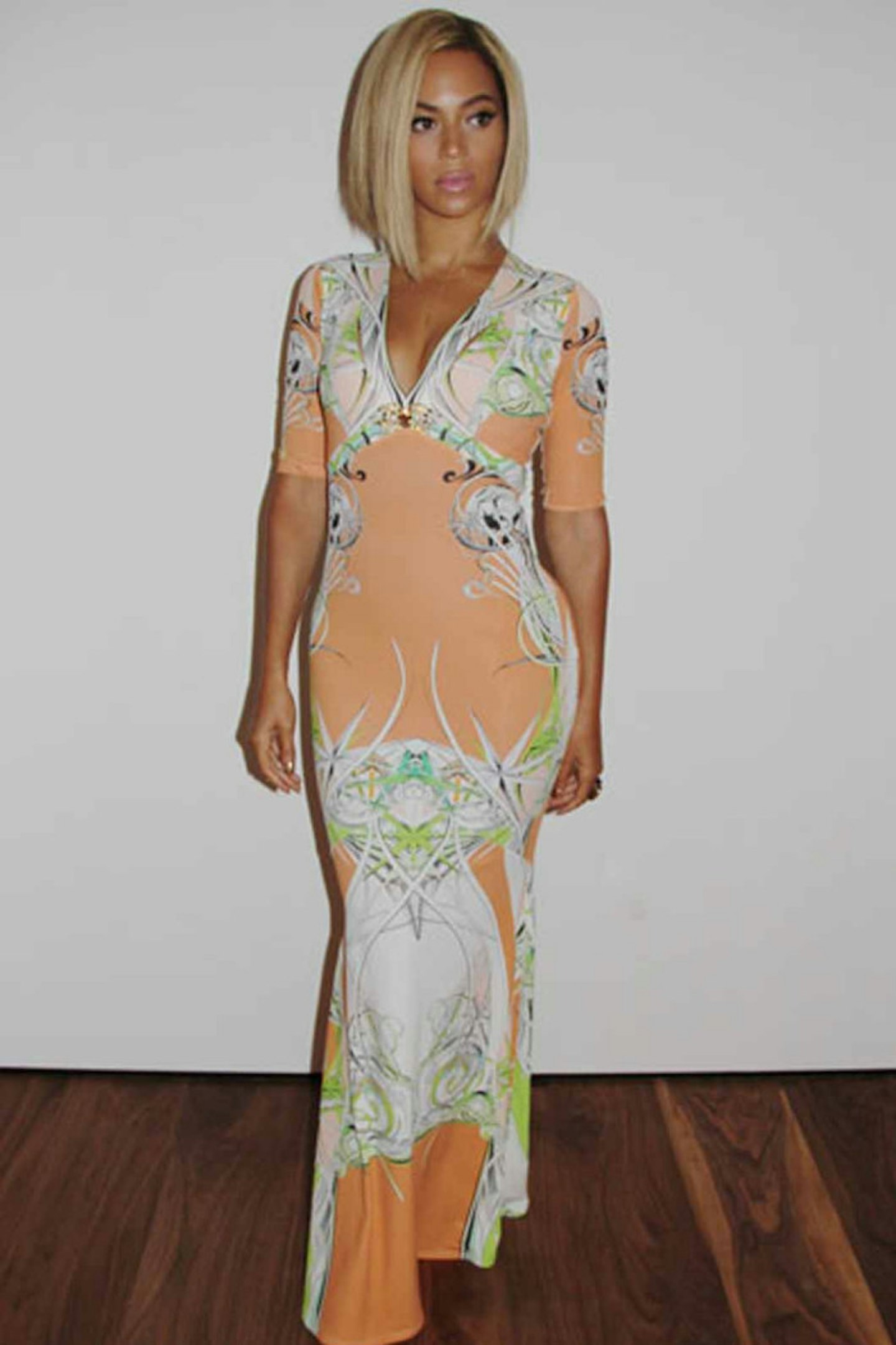 Beyonce style roberto cavalli orange print dress