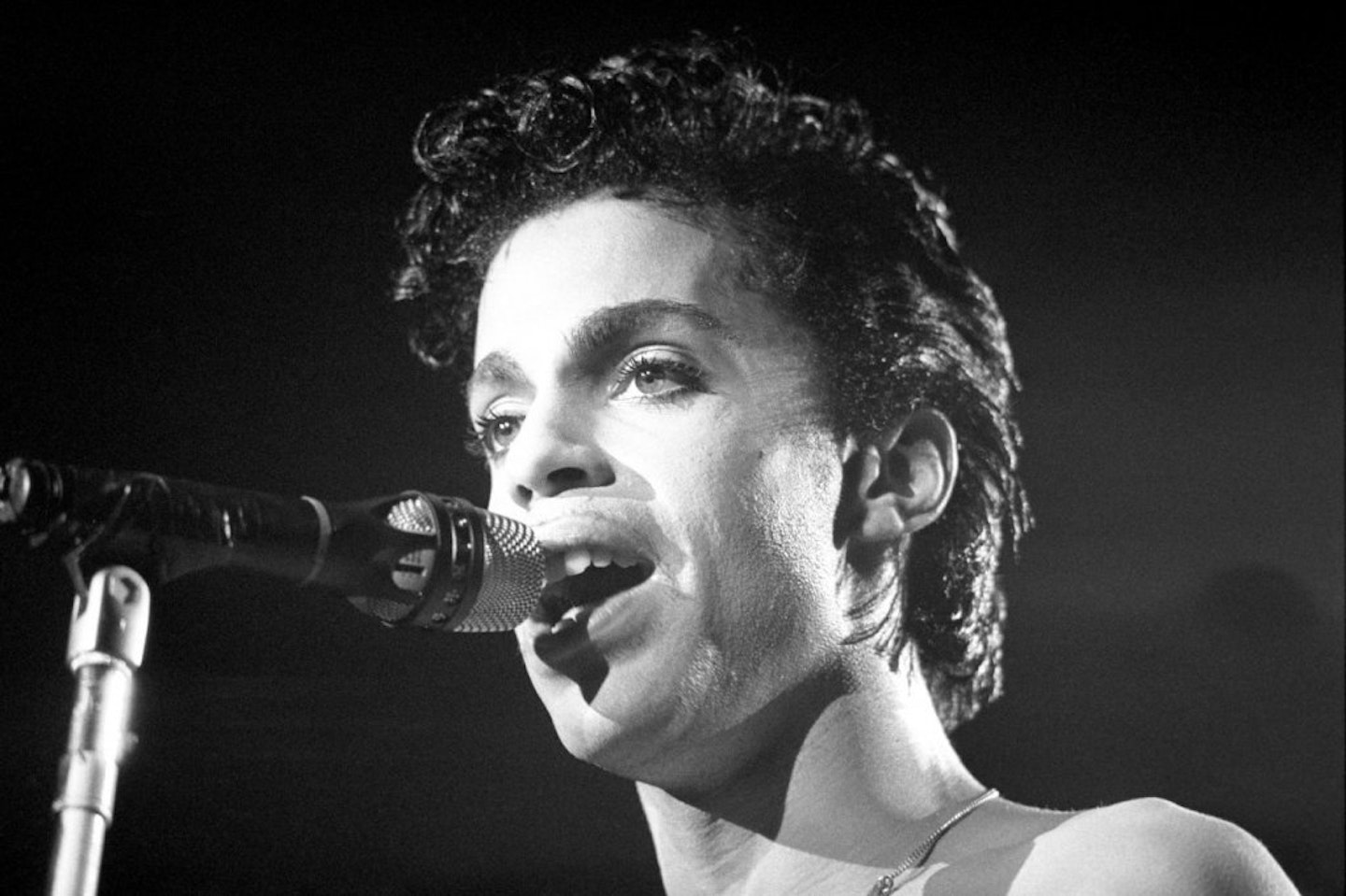 Black and white picture of Prince performing