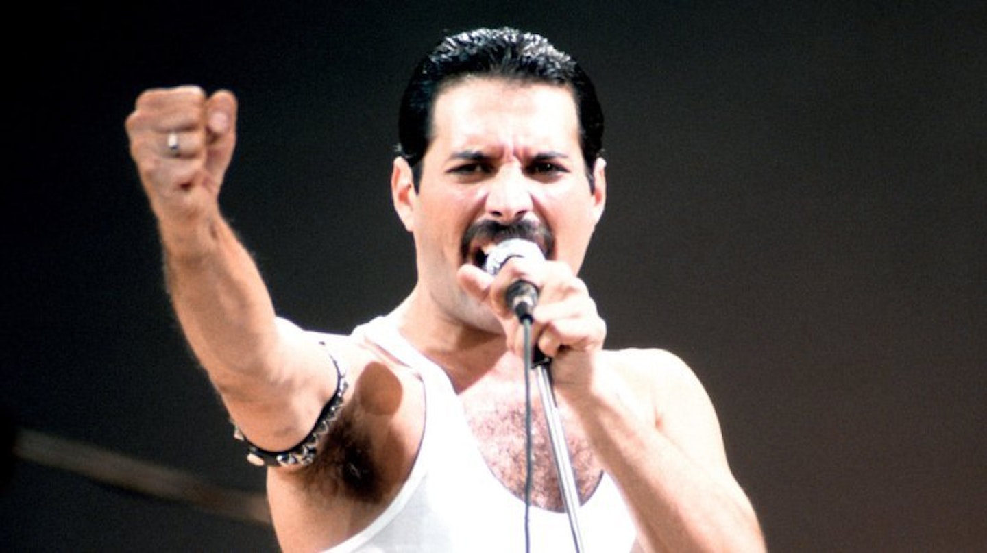 Freddie Mercury performs