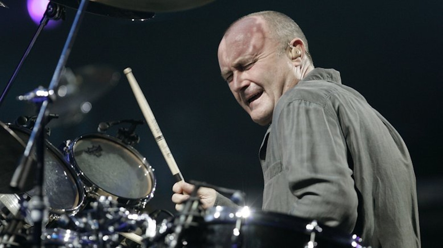 Phil Collins plays the drums