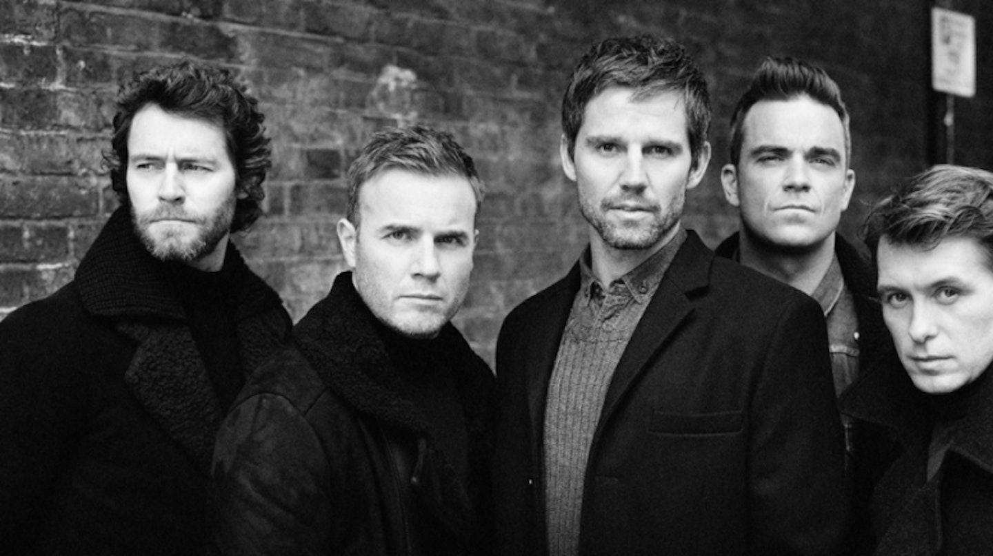 Black and white photo of Take That when Robbie was a member