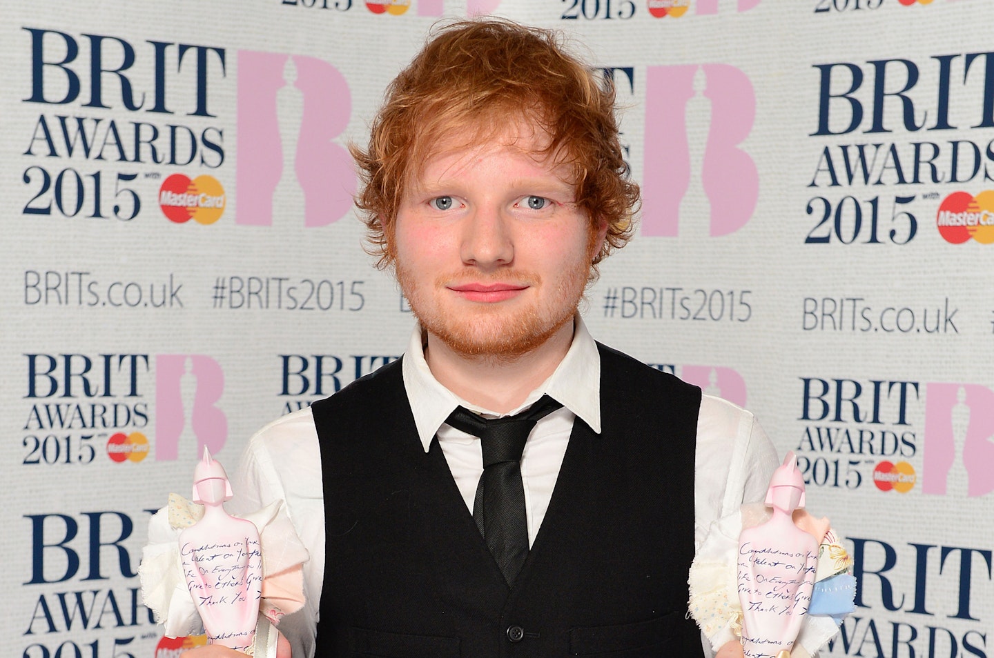 Ed Sheeran poses with his two BRIT Awards