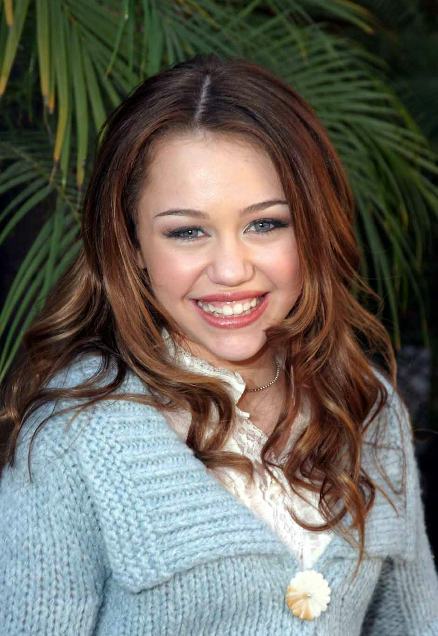 Miley attends a 'Hannah Montana' photocall (2006)