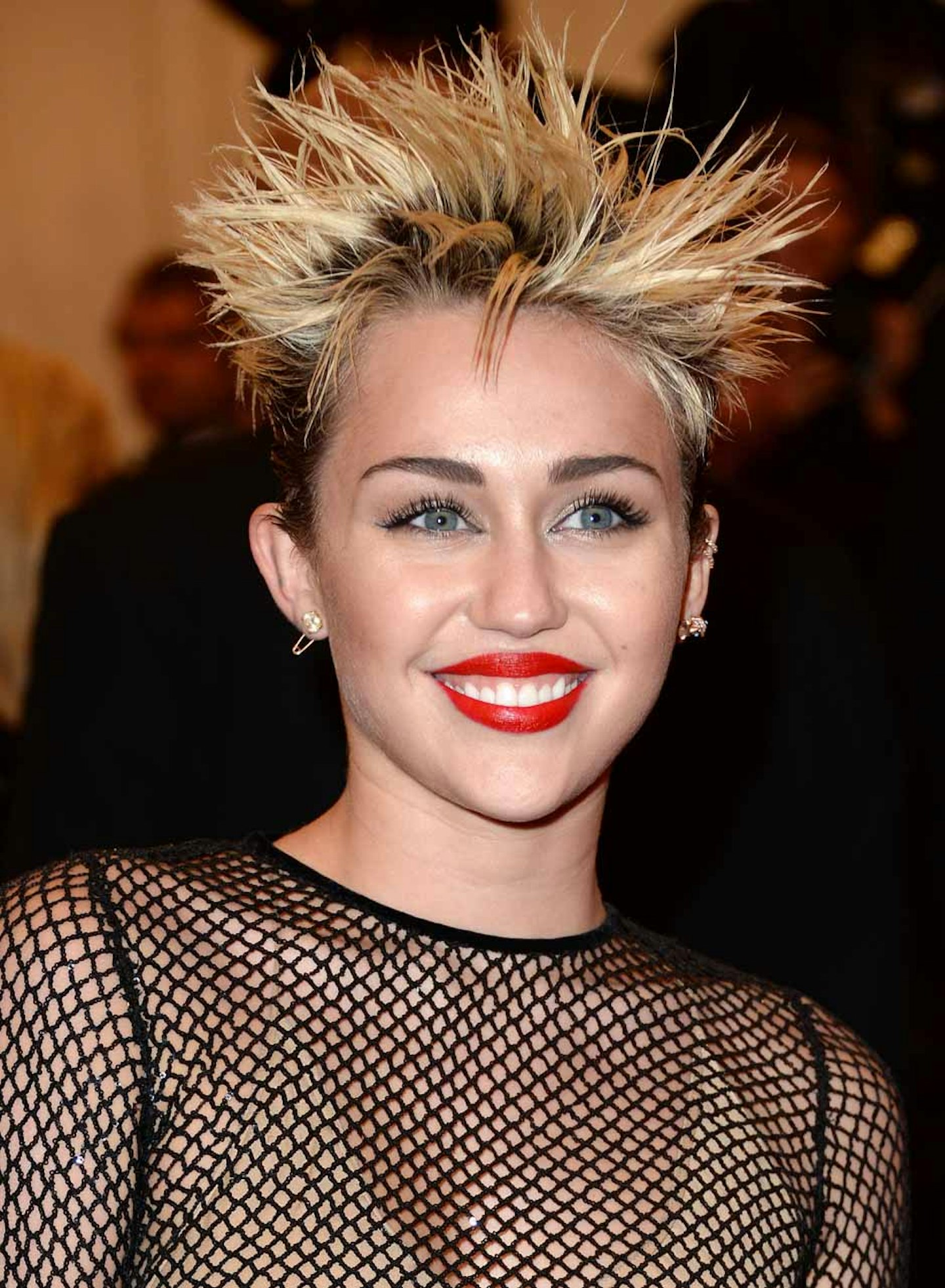 Miley celebrating PUNK Chaos to Couture (2013)