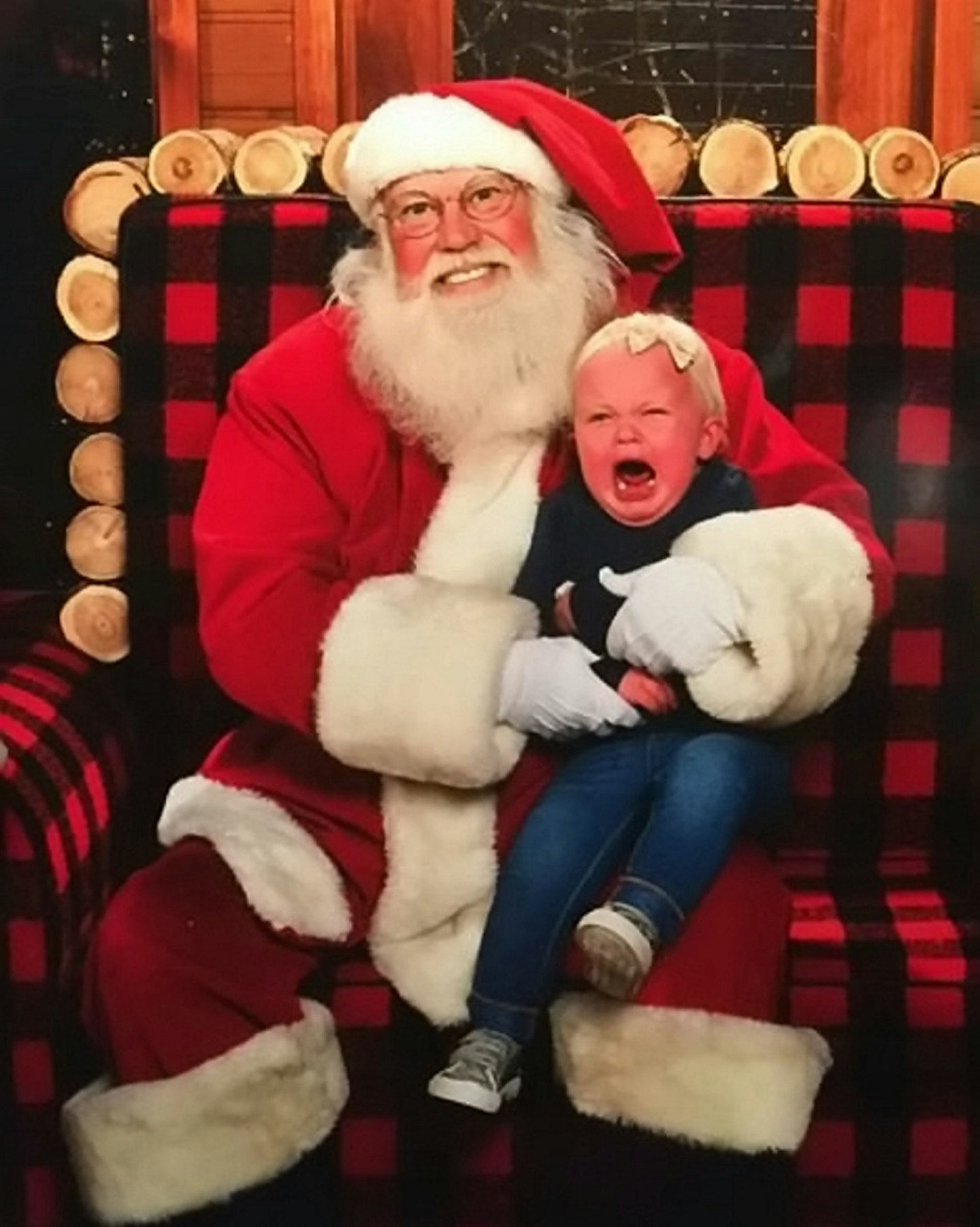 children crying santa's knee