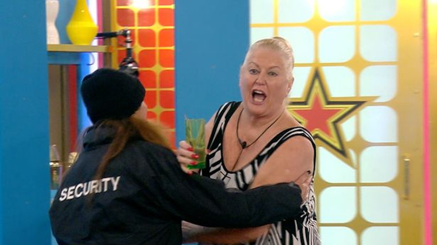 Kim Woodburn escorted out by security