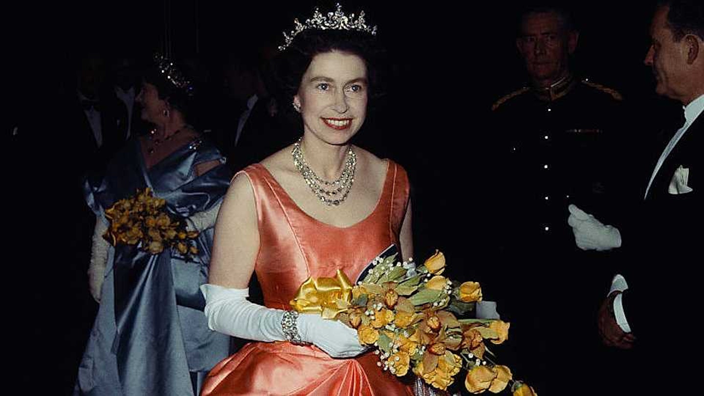 Queen holding flowers