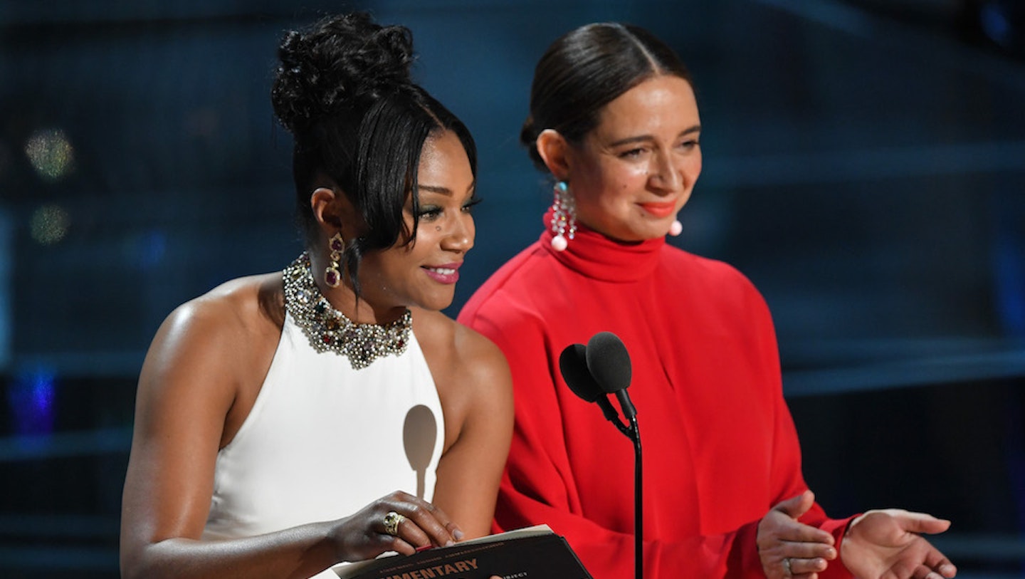 Tiffany Haddish and Maya Rudolph present at the 2018 Oscars