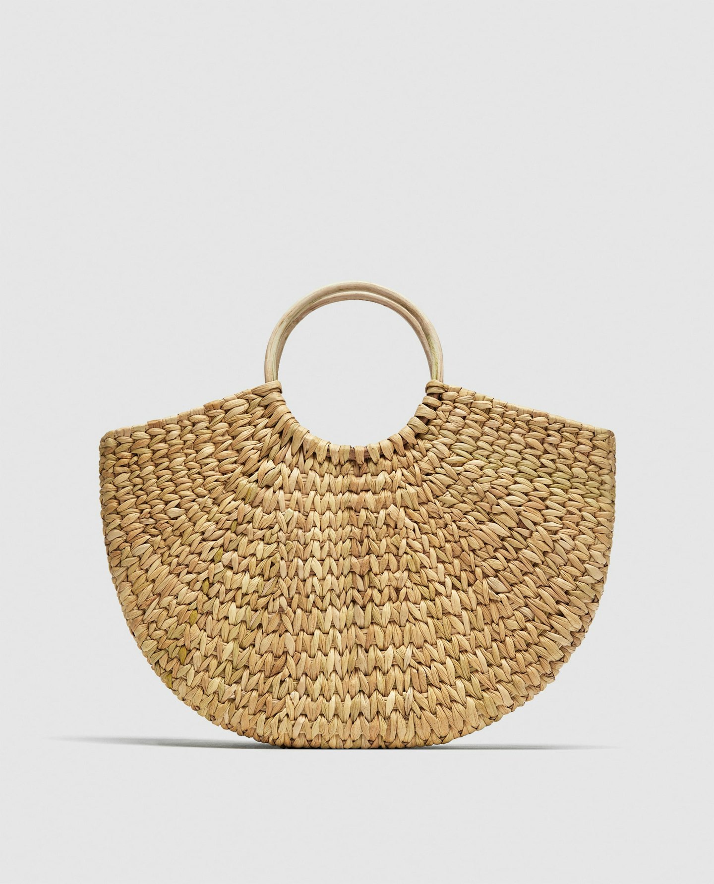 Straw bag with round handles by Zara, £29.99