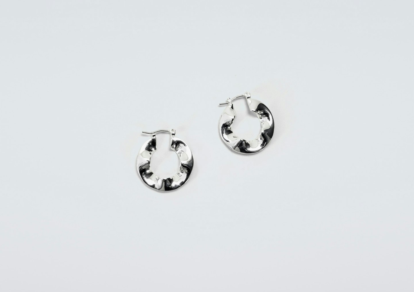 Blyne crinkle hoop earrings by Finery, £19