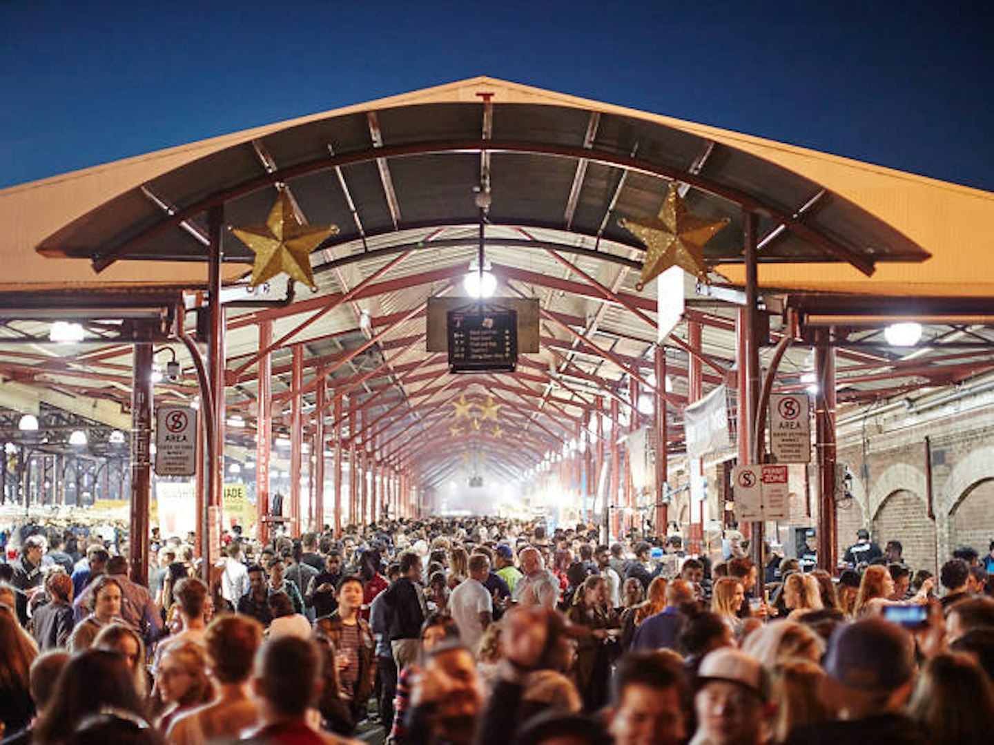 Experience the iconic Queen Victoria Market at night