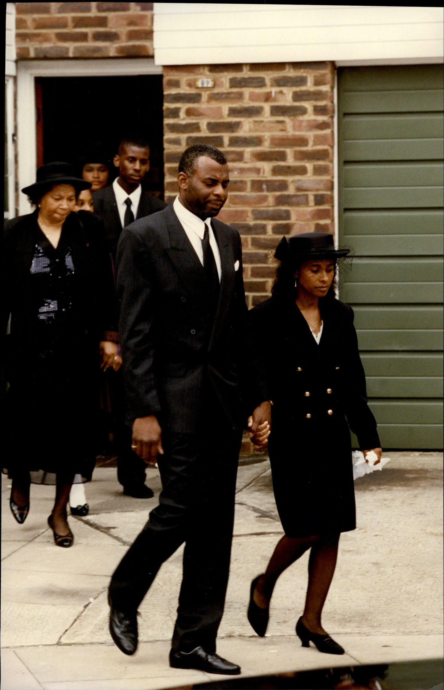 Neville and Doreen Lawrence leave for the funeral of their son, Stephen