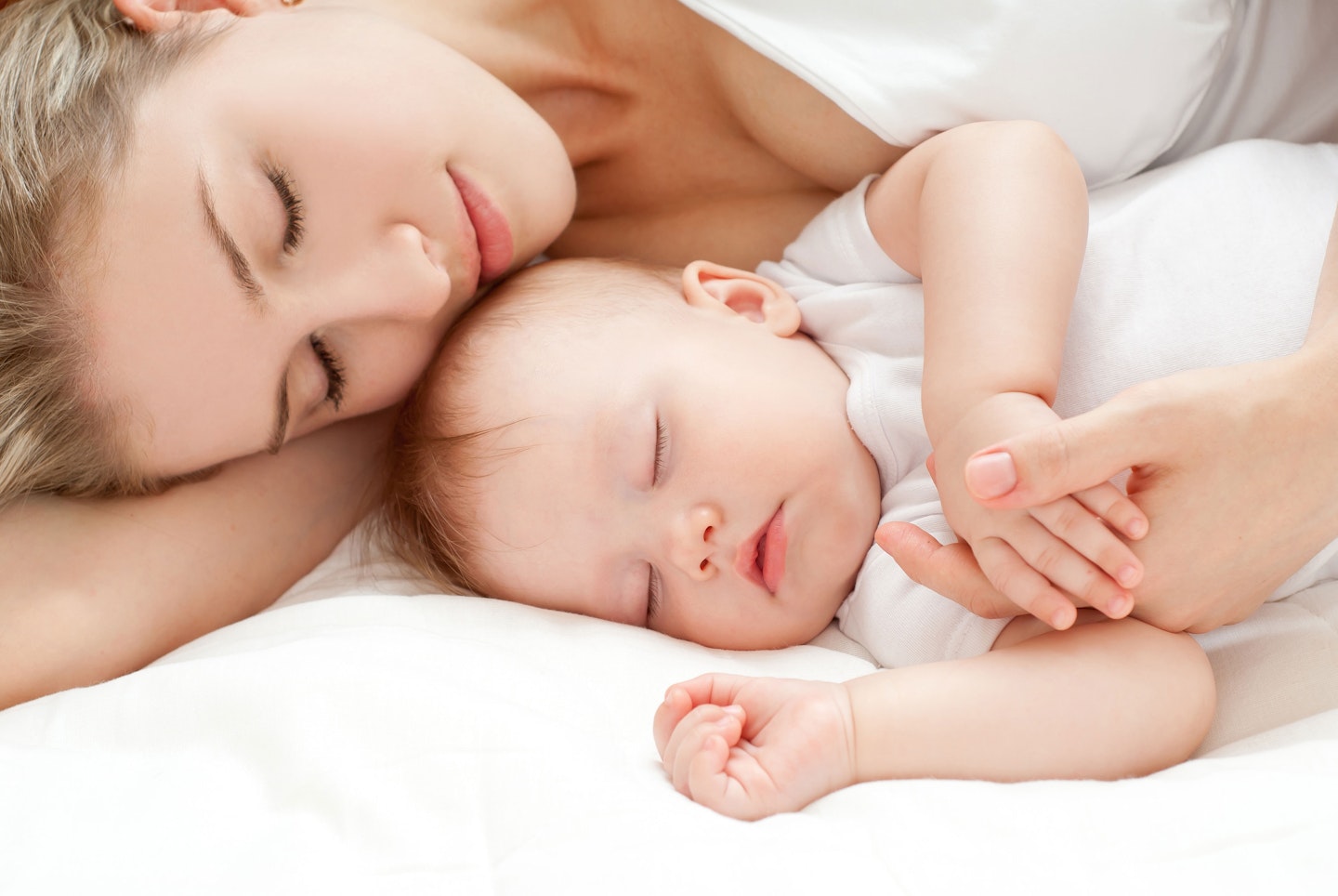 Sleeping with a newborn baby: survival tips