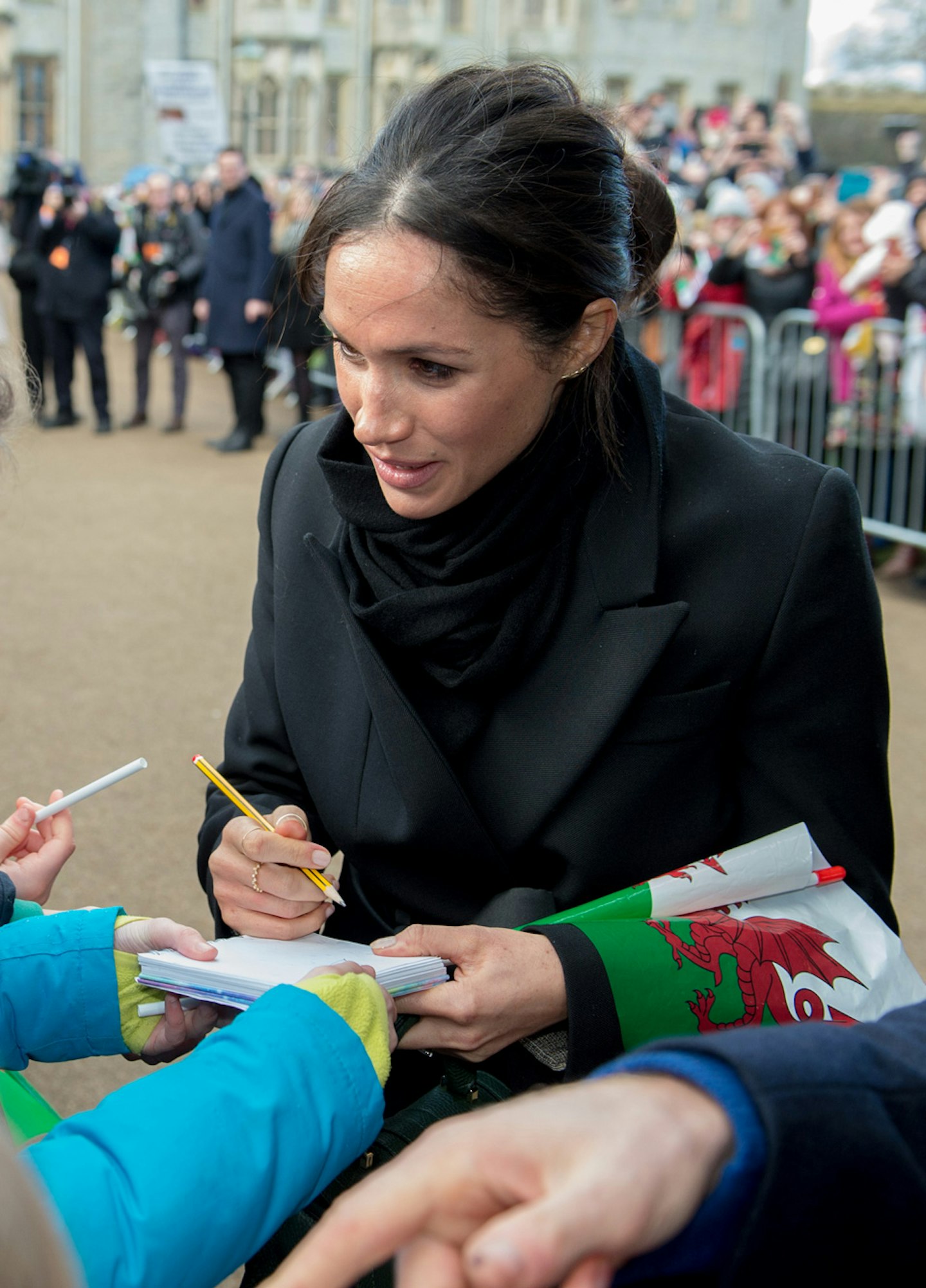 Meghan Markle signing 