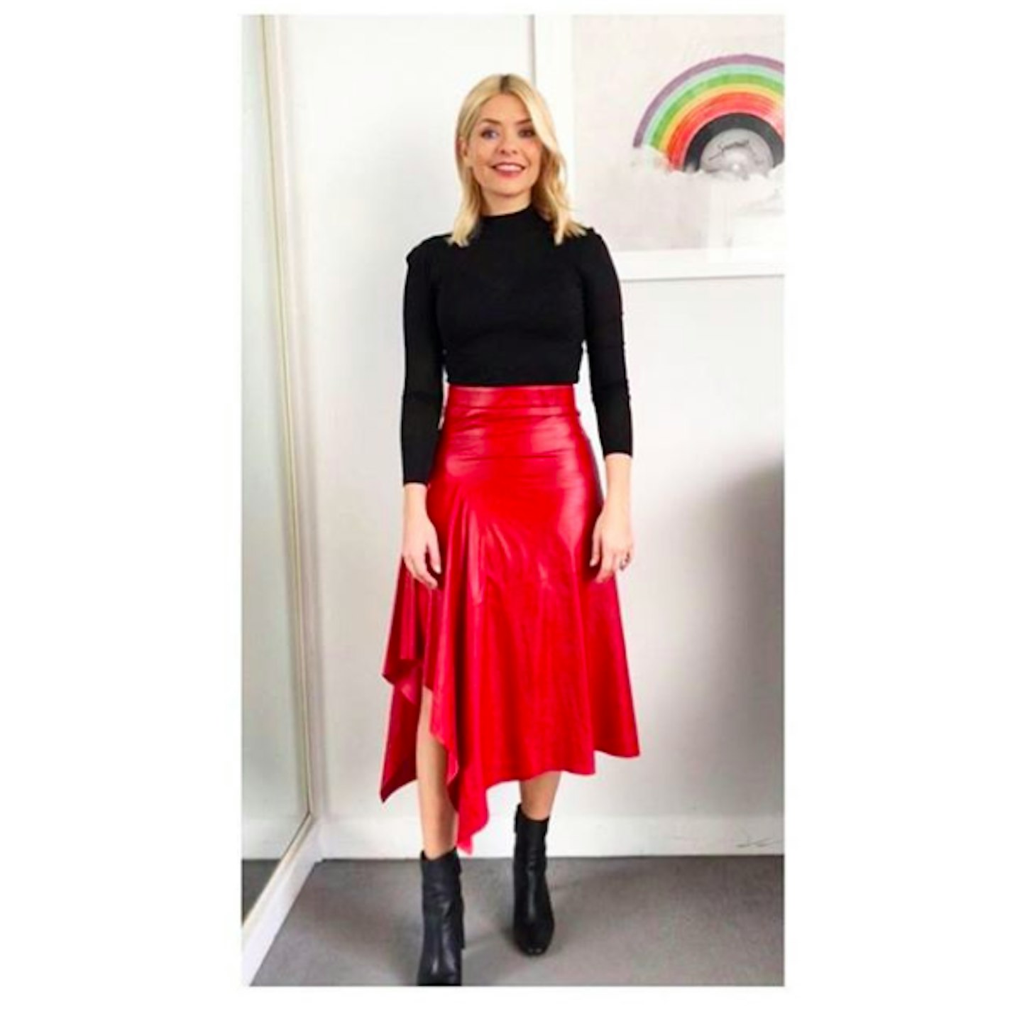 Holly Willoughby's faux leather midi skirt is a timeless classic