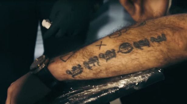 A tour of Robbie Williams' tattoos and their meanings | HELLO!