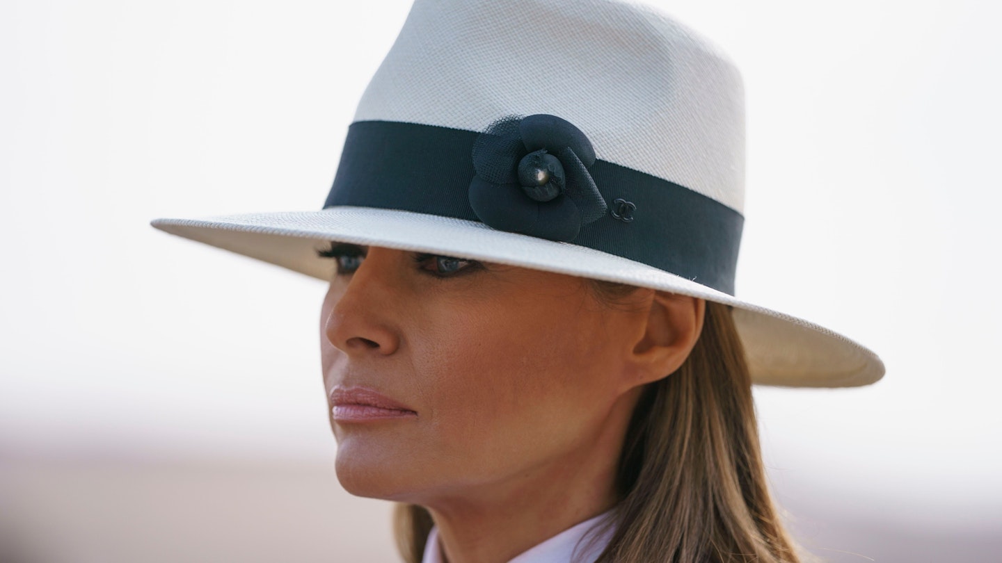 Melania Trump with a hat on