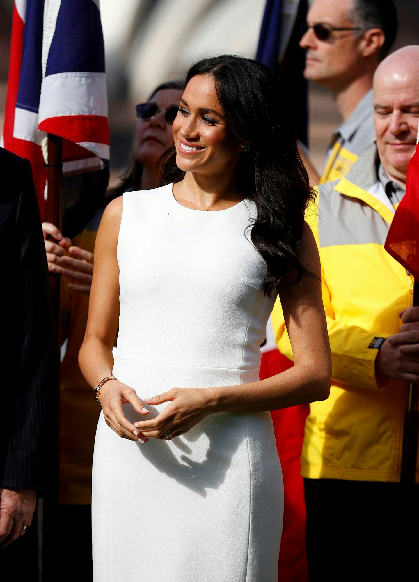 Meghan Markle shows off tiny baby bump