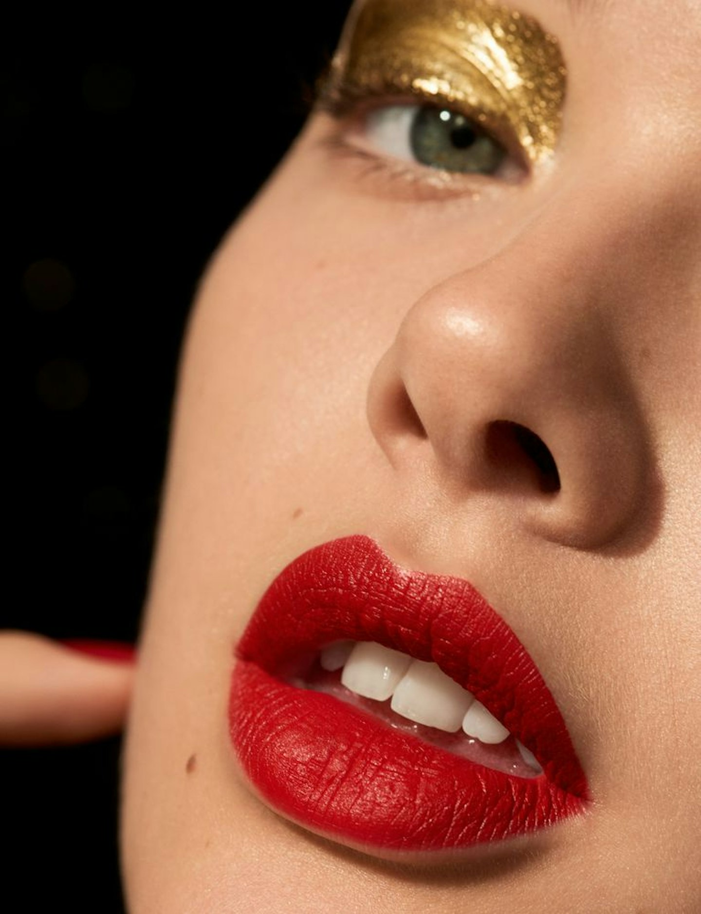 red lip and gold eye