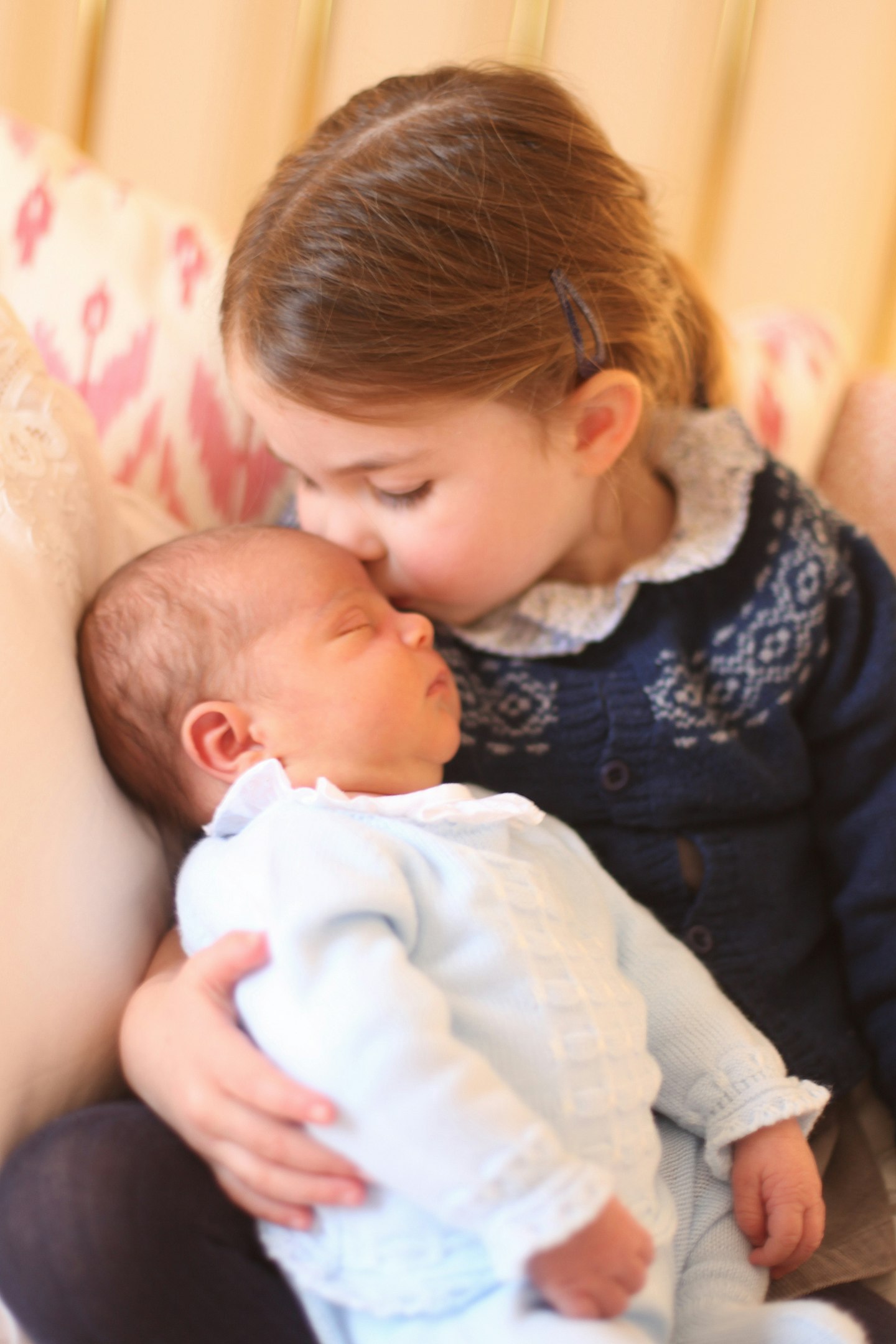 Princess Charlotte wore Prince George's jumper for royal photo when Louis was born as well as in the Christmas card