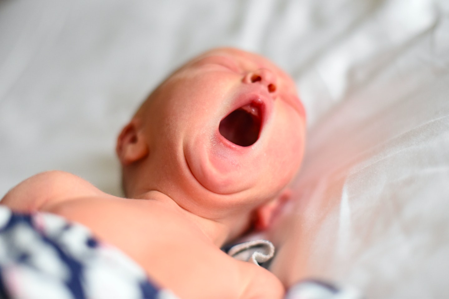 new born baby yawning