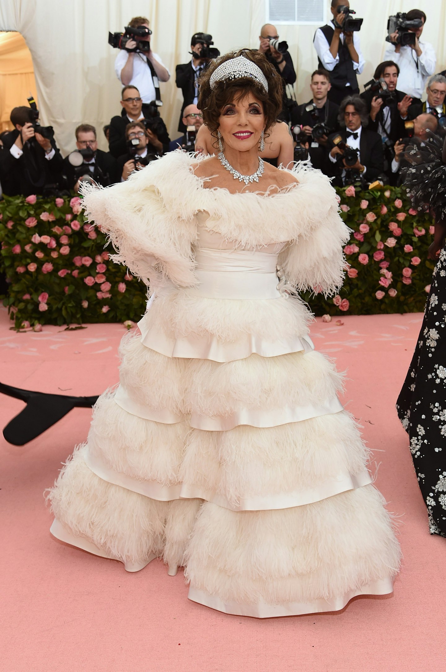 Joan Collins in a Valentino gown