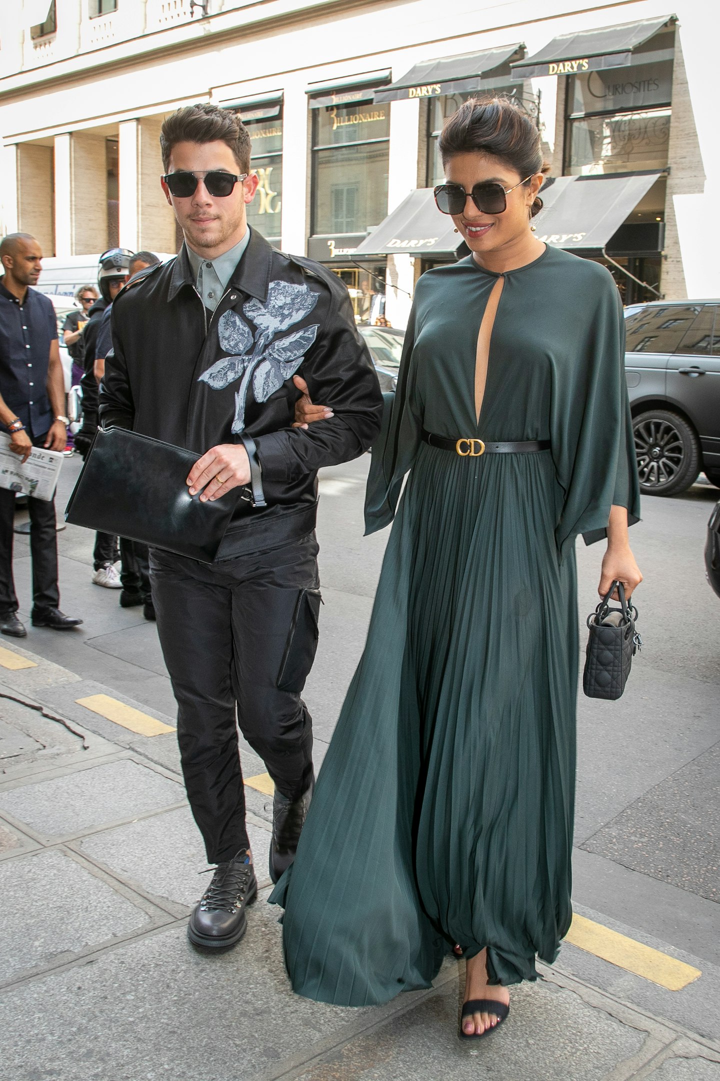 Priyanka Chopra and Nick Jonas arriving at the Dior show