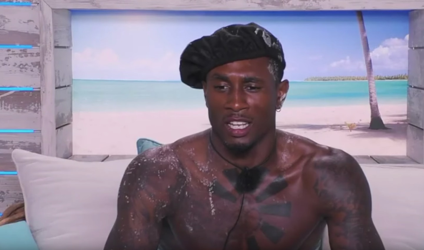 ovie from love island wearing a beret