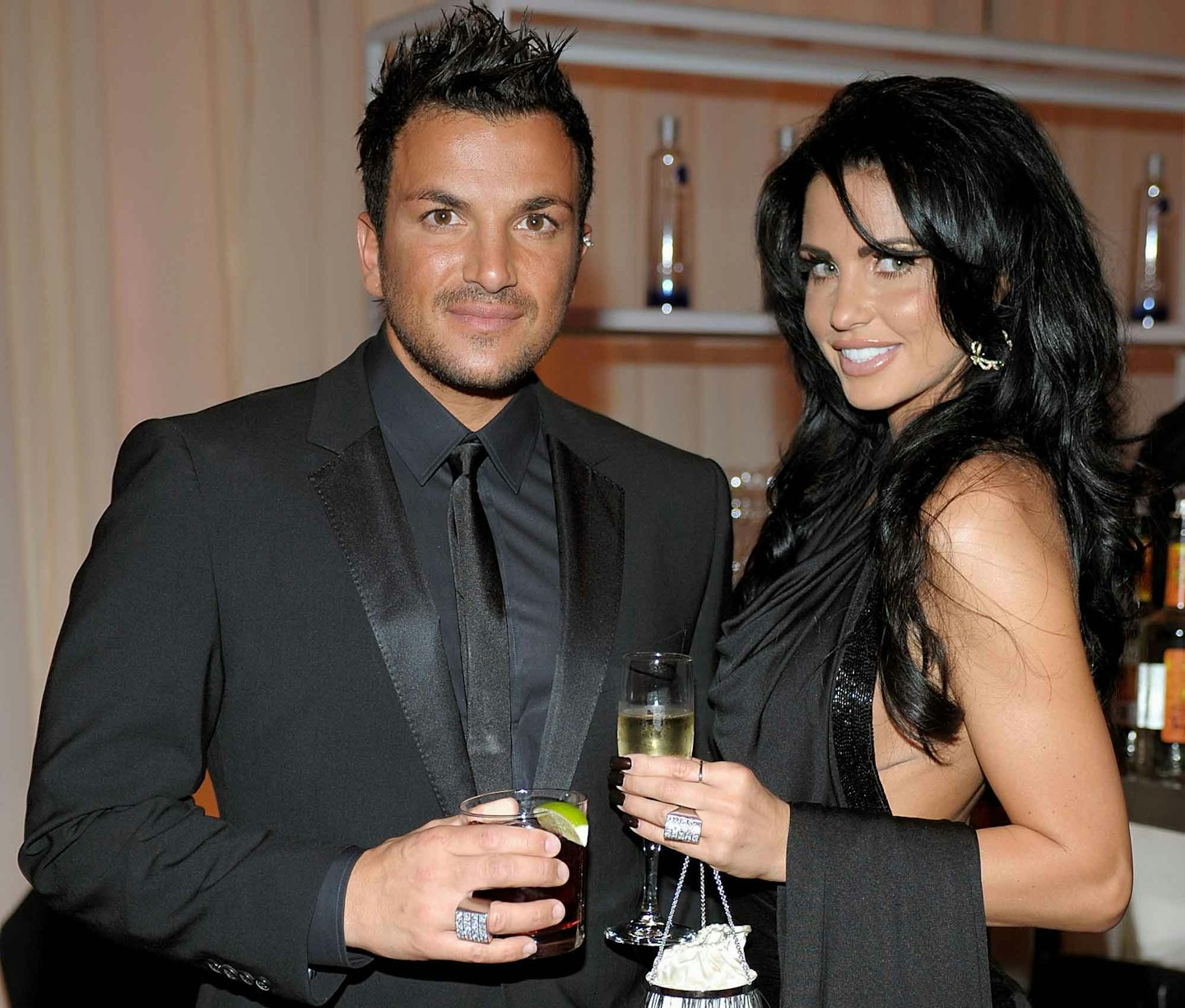 Peter Andre and Katie Price drinking