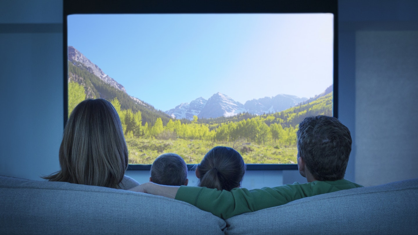 Family watching Blu-ray film