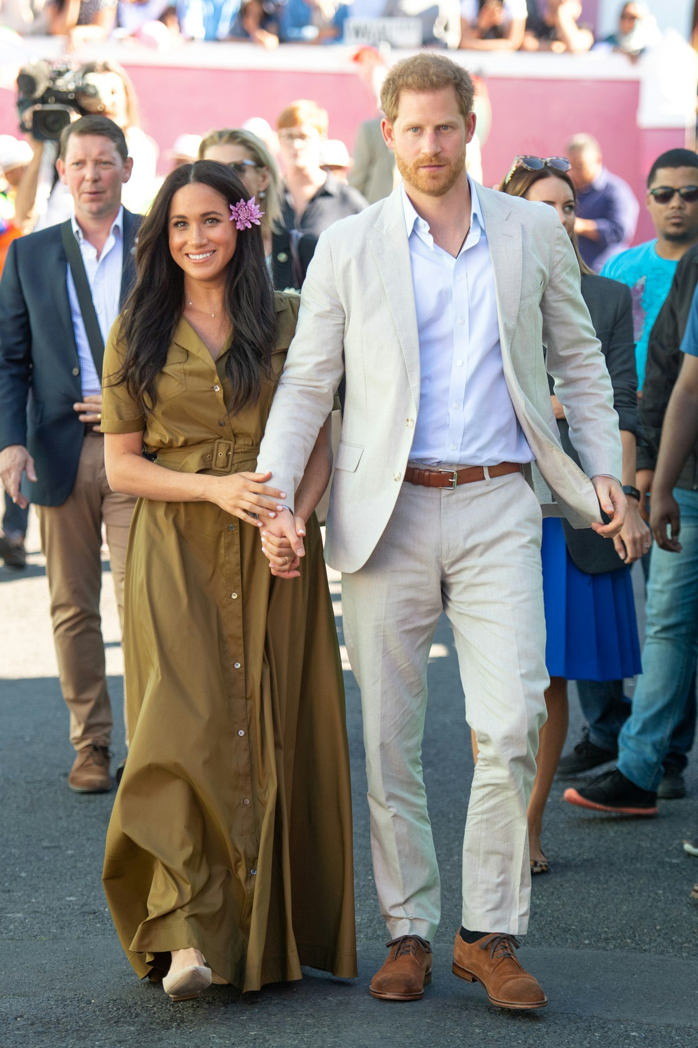 Meghan Markle in a recycled Staud dress