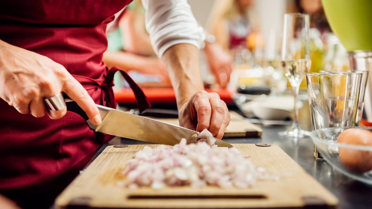Kitchen knife chopping garlic 
