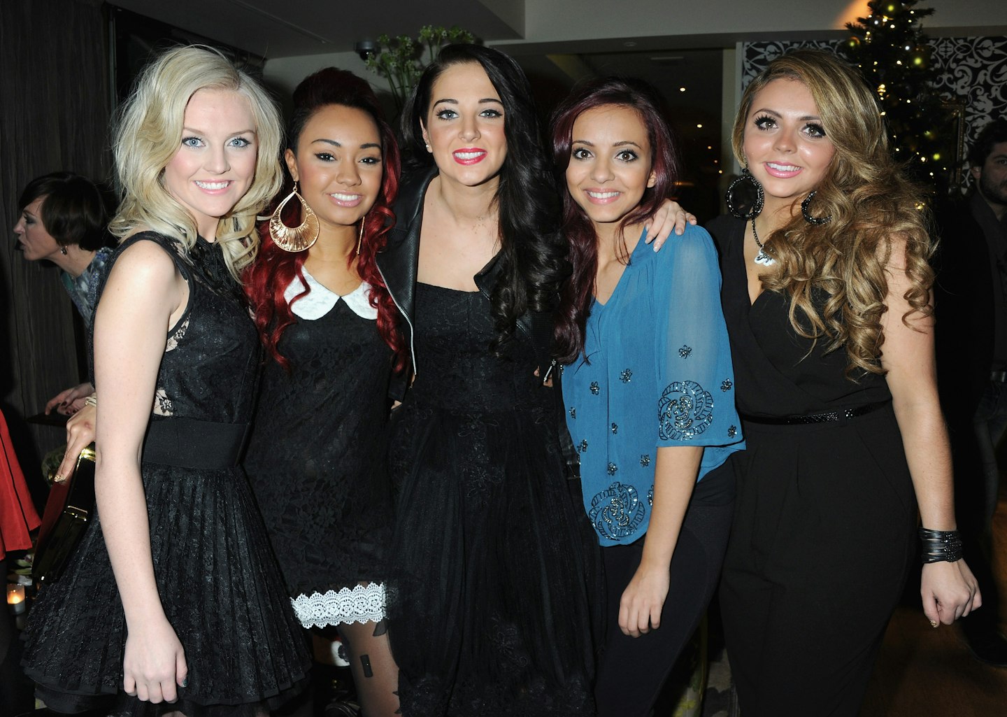 Little Mix with their X Factor mentor Tulisa in 2011