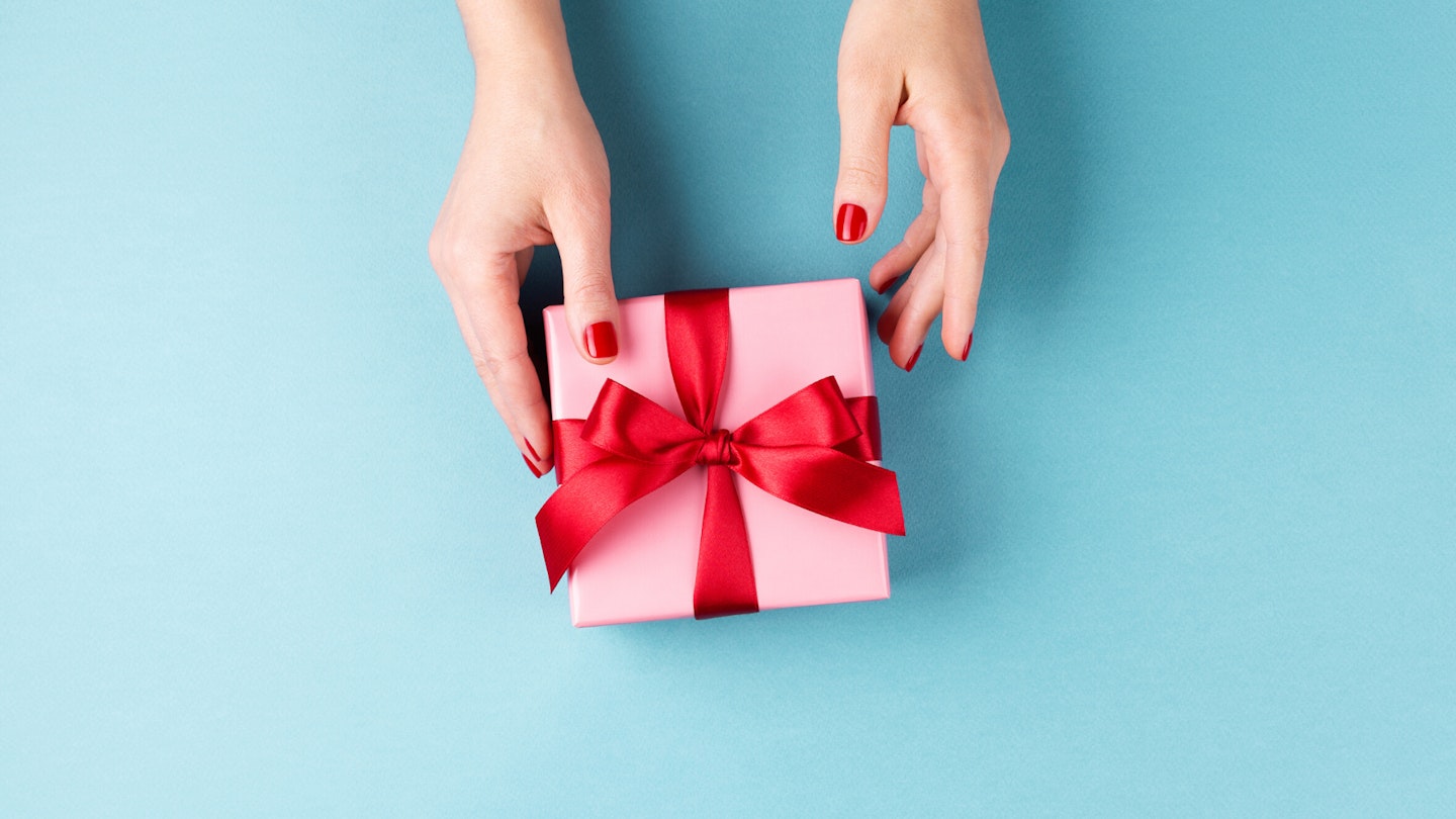 Woman's hands with present
