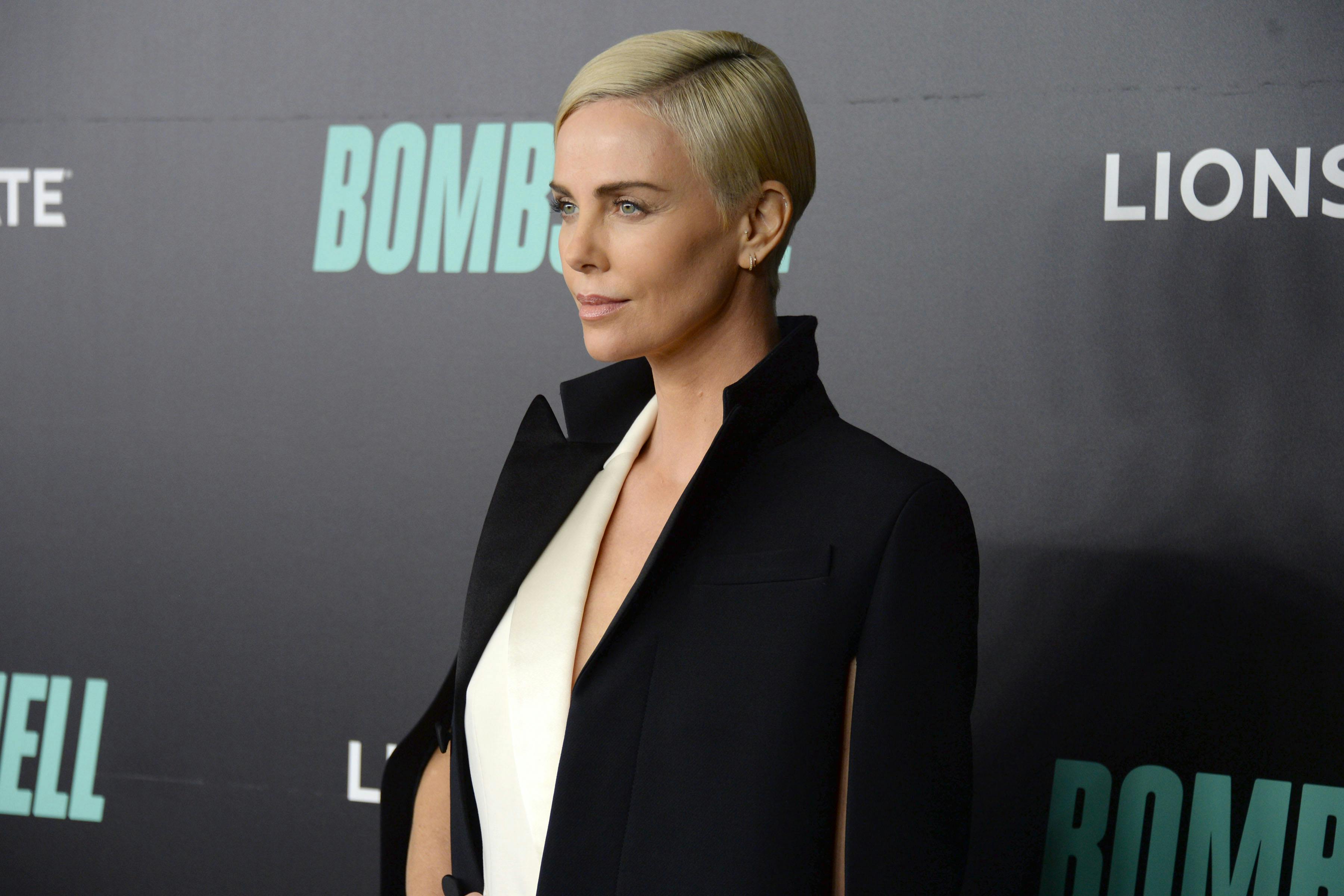 Charlize Theron Says She Isn’t Ashamed To Talk About When Her Mum