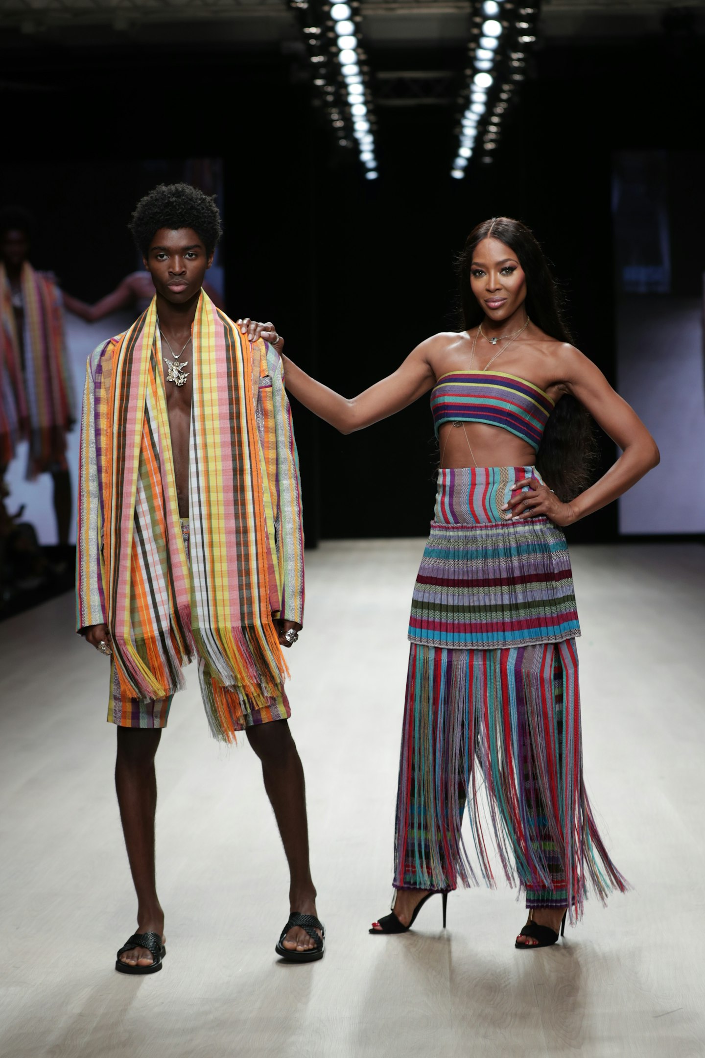 Alton Mason and Naomi Campbell walking the runway for Kenneth Ize at Arise Fashion Week in Lagos, Nigeria