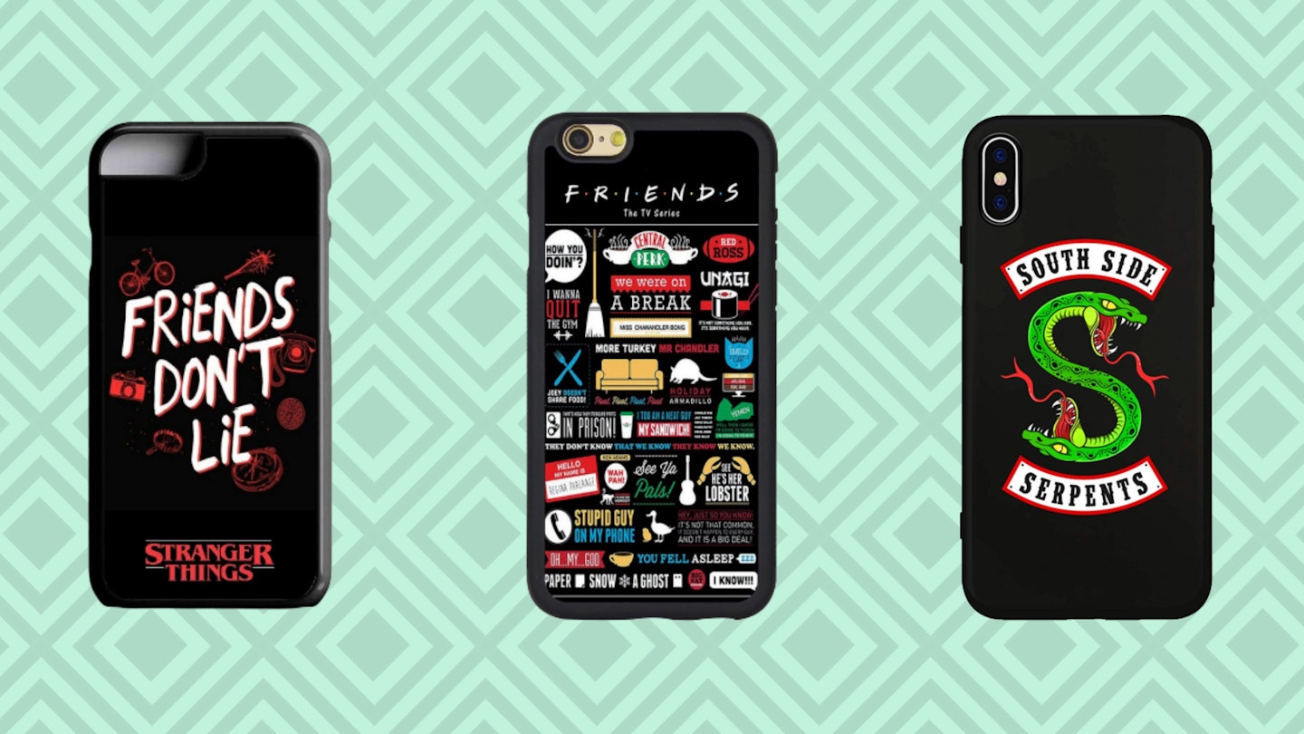 Various phone cases on green background
